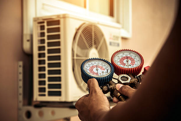 Professional Heat Pump Repair technician working in Lindale, GA